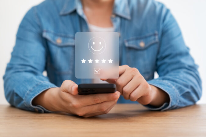 customer satisfaction survey concept business people use smartph Online Reviews